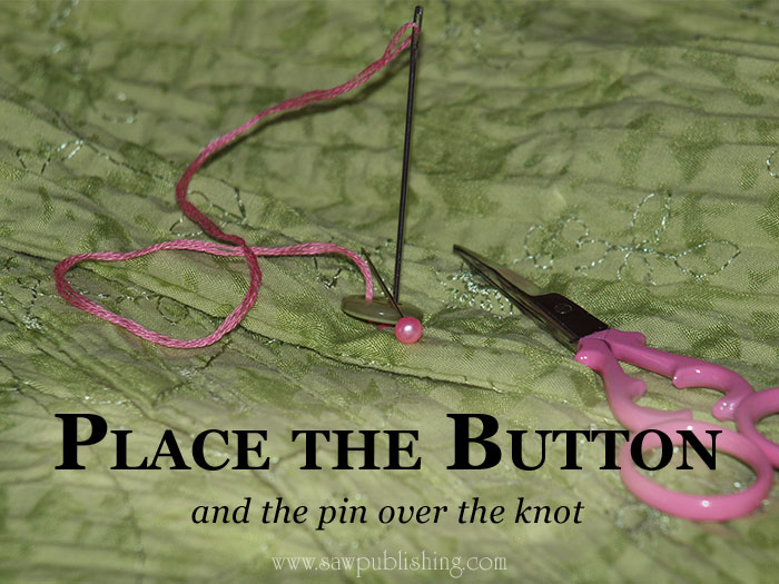 Is there a right way to sew on a button? Here’s an ingenious Timeless Tip for how to sew on a button with a needle – and a pin. 